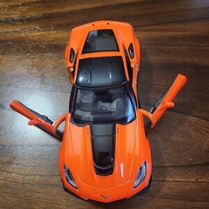 MotorMax Toy Corvette ZRI 1:24 scale. Orange. 2019. 8 inches. Doors open